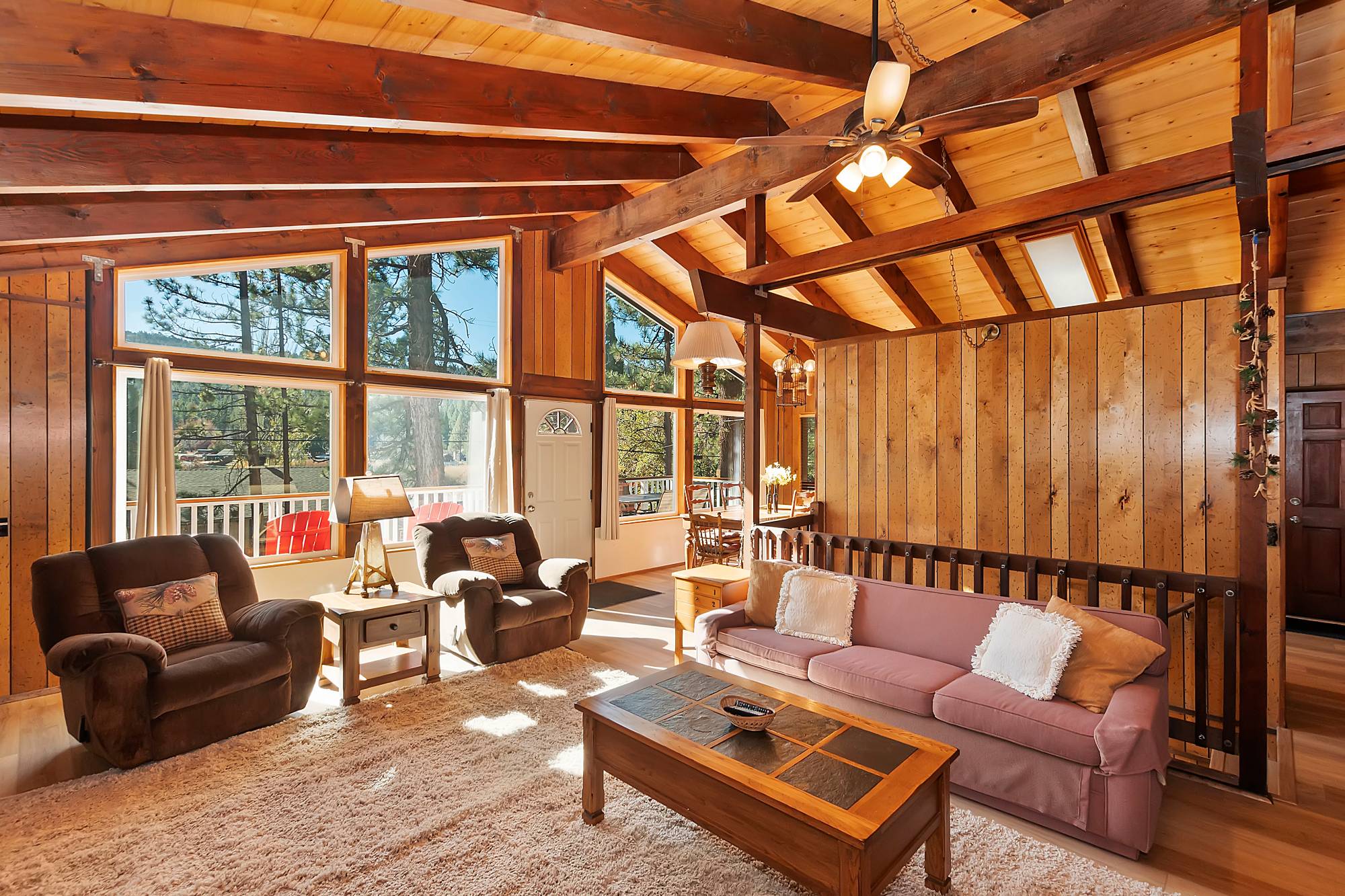 Cabin living room with vaulted ceiling at Bear View Escape in Big Bear Lake